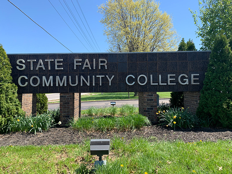 The roadside State Fair Community College sign at the primary campus entrance.